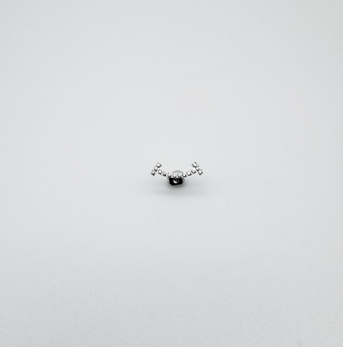 HAPPY CURVED EARRING WITH TRANSPARENT ZIRCONIA